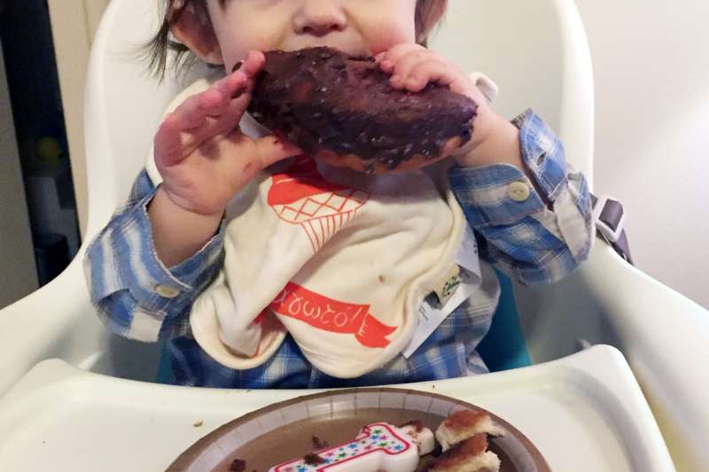 One-year-old Luke, having his cake and eating it too