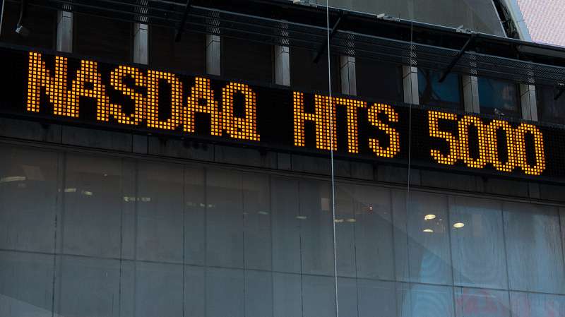 The Times Square news-ticker announces the NASDAQ composite index topping 5,000 points on March 2, 2015 in New York City. The NASDAQ composite climbed over 5,000 points for the first time in 15 years.