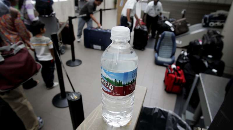 Water near a checked-baggage inspection station at Terminal One at Los Angeles International Airport.