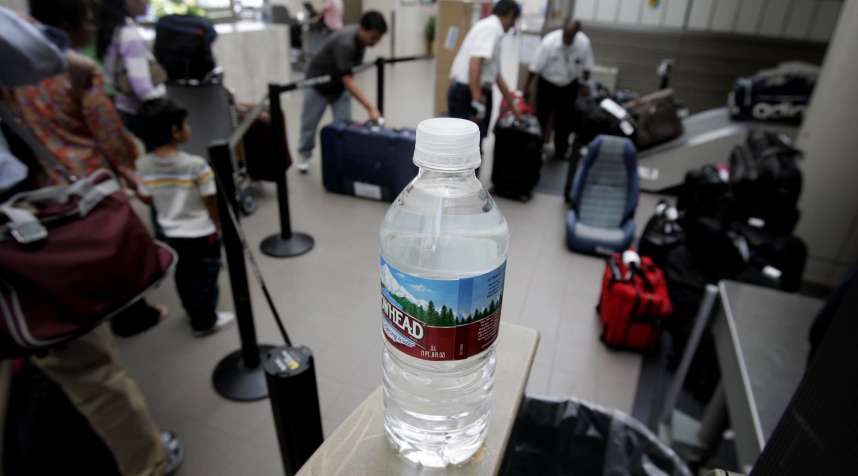 Water near a checked-baggage inspection station at Terminal One at  Los Angeles International Airport.