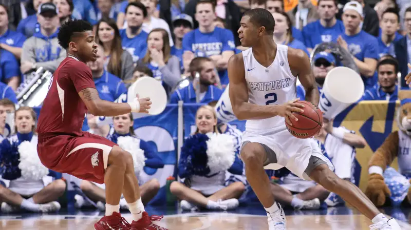 Kentucky Wildcats guard Aaron Harrison (2) looks for a way around Arkansas Razorbacks guard Anton Beard (31) during the Arkansas Razorbacks versus the Kentucky Wildcats championship game in the 2015 SEC Men's Basketball Tournament at Bridgestone Arena in Nashville, TN.