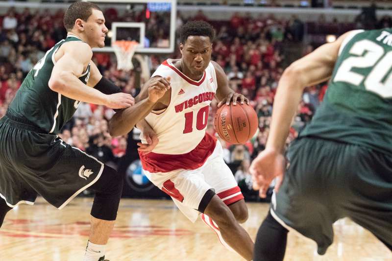 Wisconsin Badgers forward Nigel Hayes (10) handles the ball during the Big Ten Conference Championship NCAA college basketball game against the Michigan State Spartans Sunday, March 15, 2015, in Chicago. The Badgers won 80-69 in overtime.