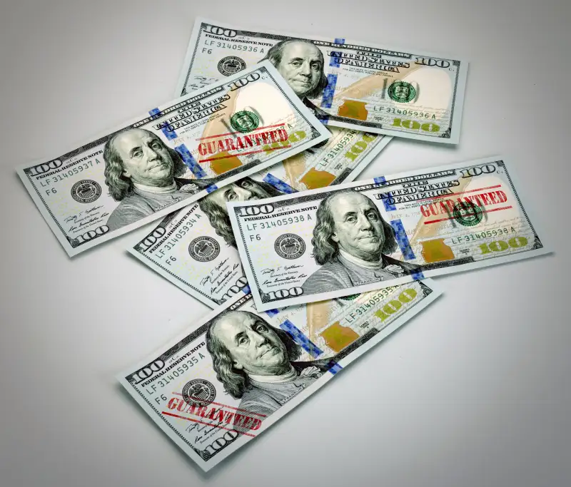 money with guaranteed stamps on it