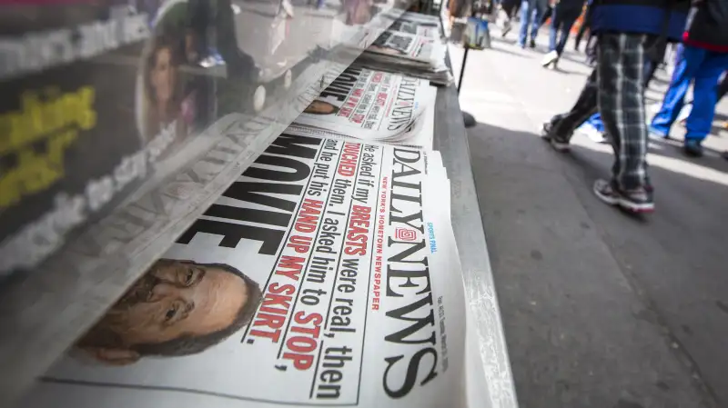 Copies of the New York Daily News are displayed on a newsstand in New York's Times Square