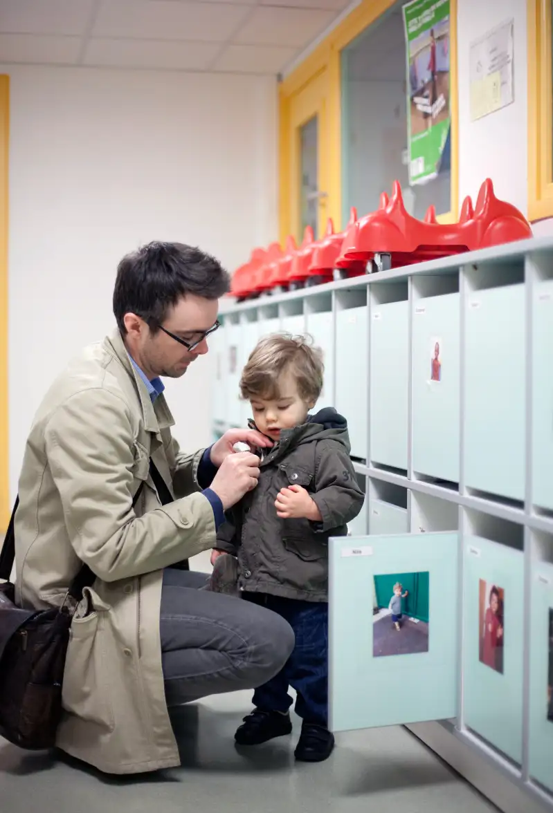 father with son at daycare