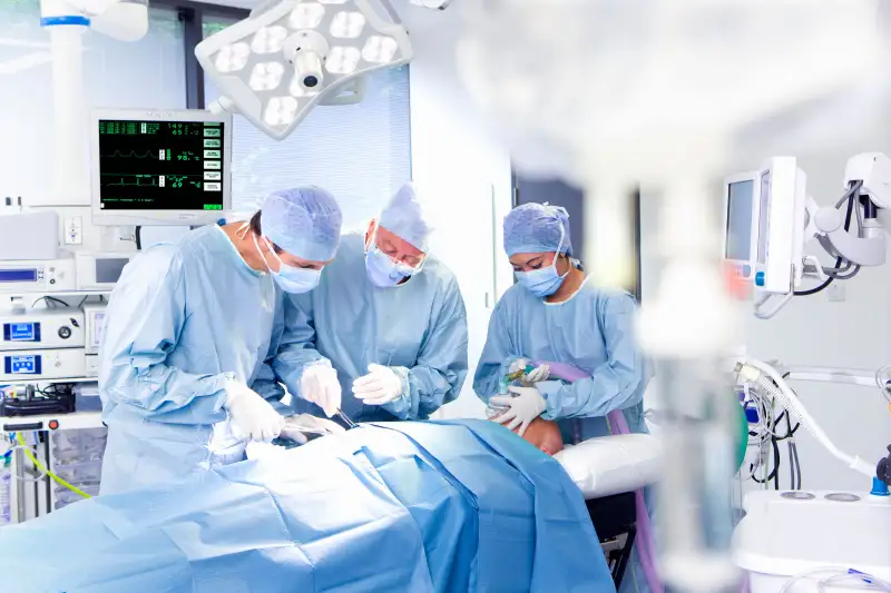 Concentrating surgeons performing operation in operating room