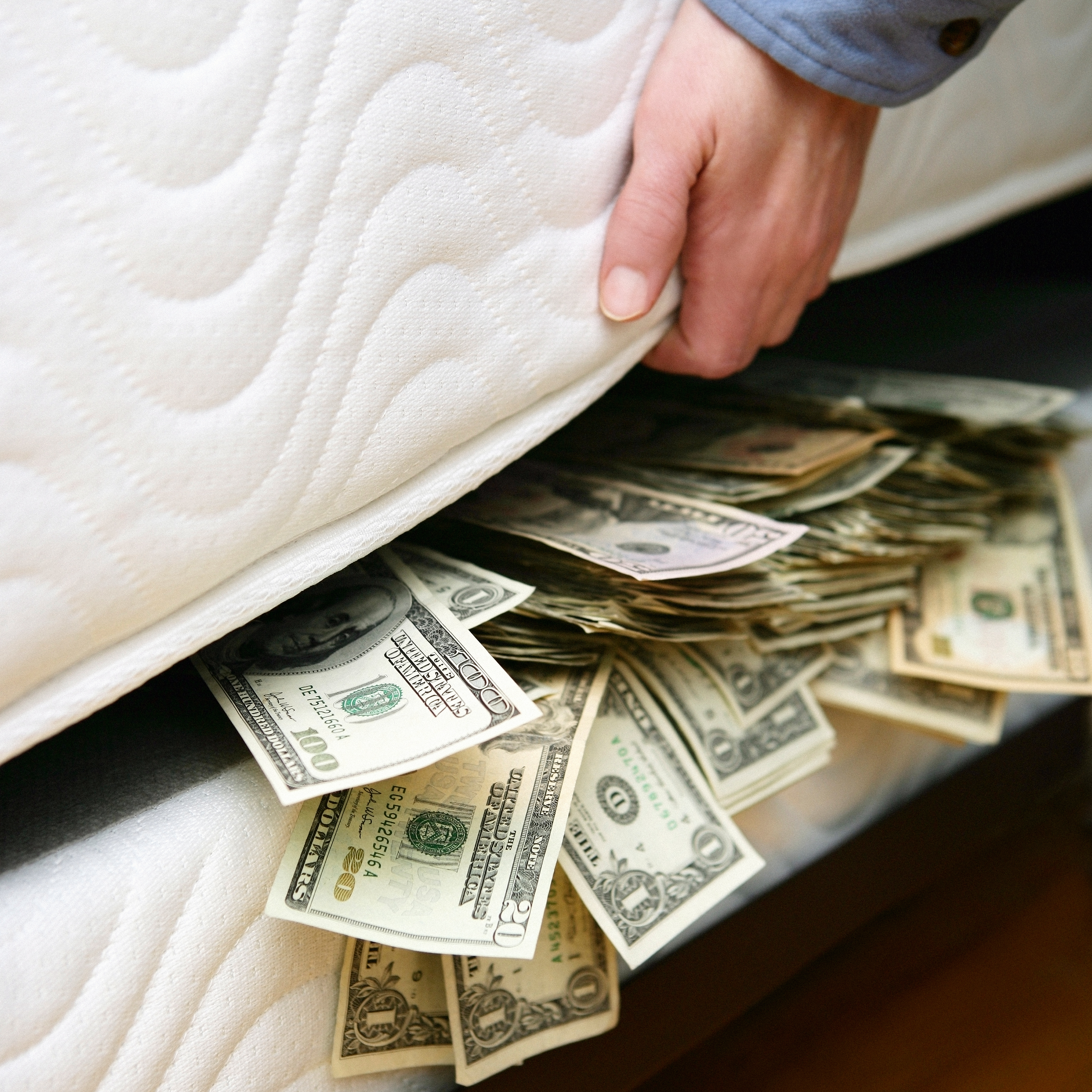 money tucked in mattress