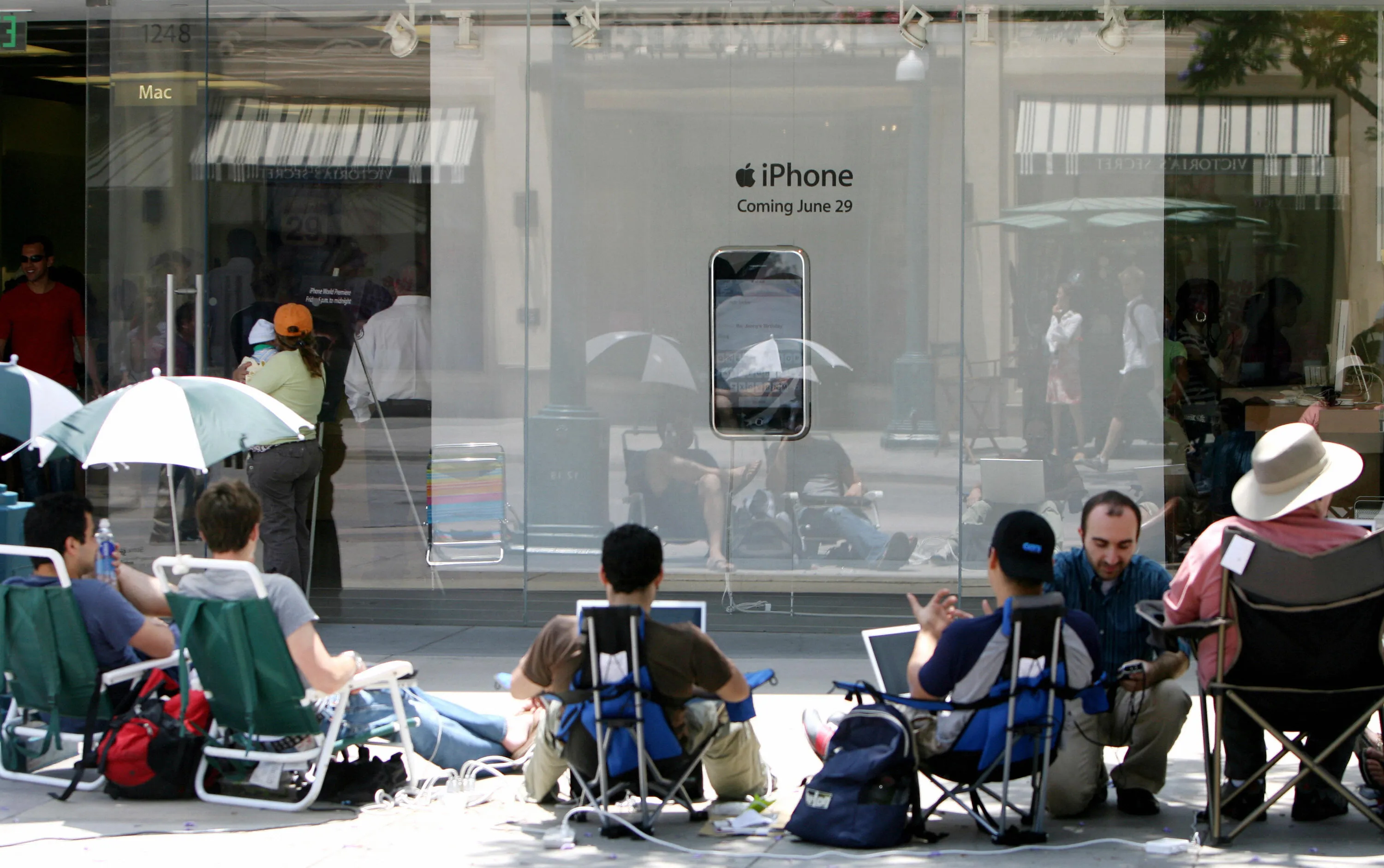 People wait outside an Apple store on  June 28, 2007, in Santa Monica, California for the iPhone, scheduled to be released at 6:00 pm the next day.