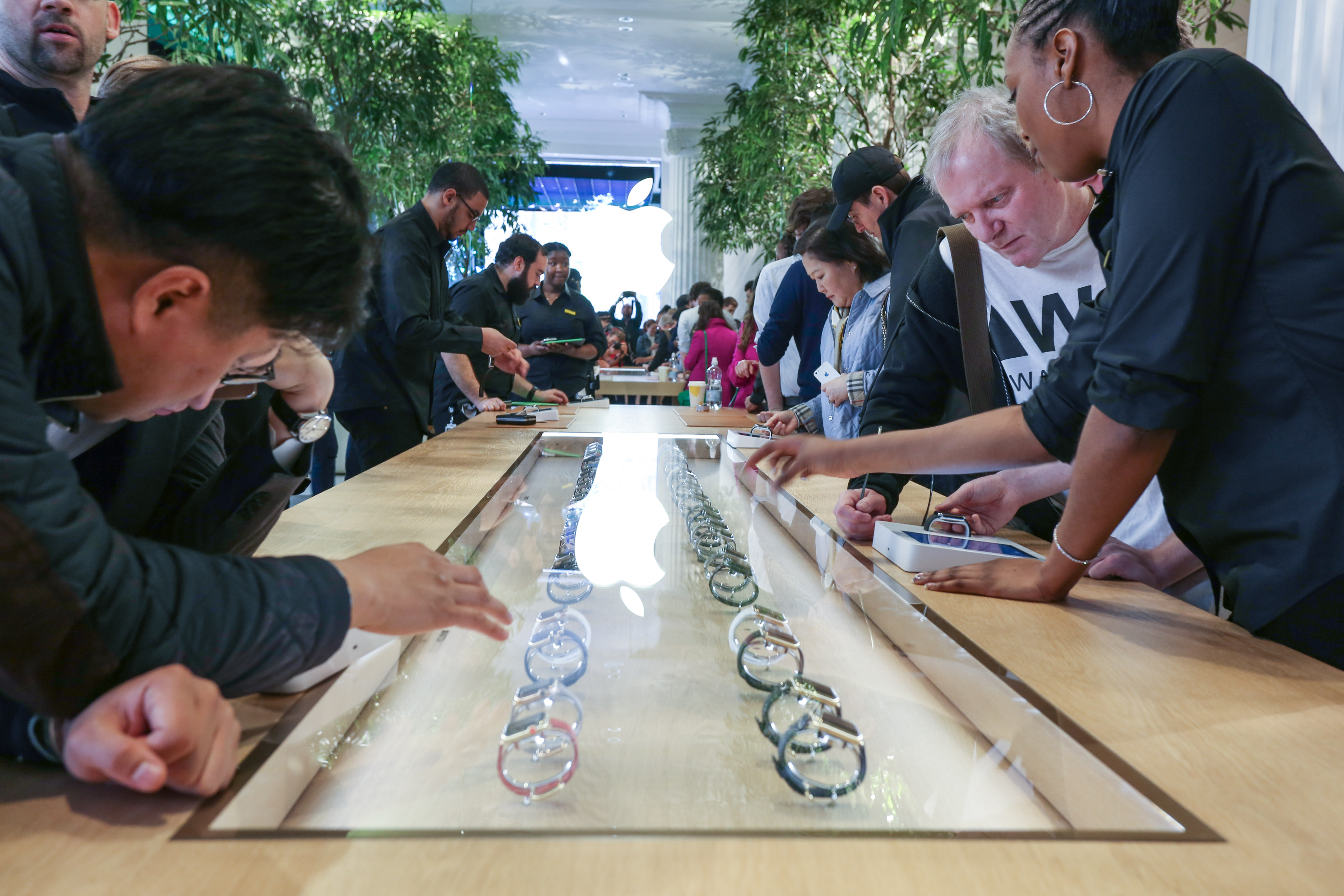 Onlookers gaze at the Apple Watch during a preview in London.