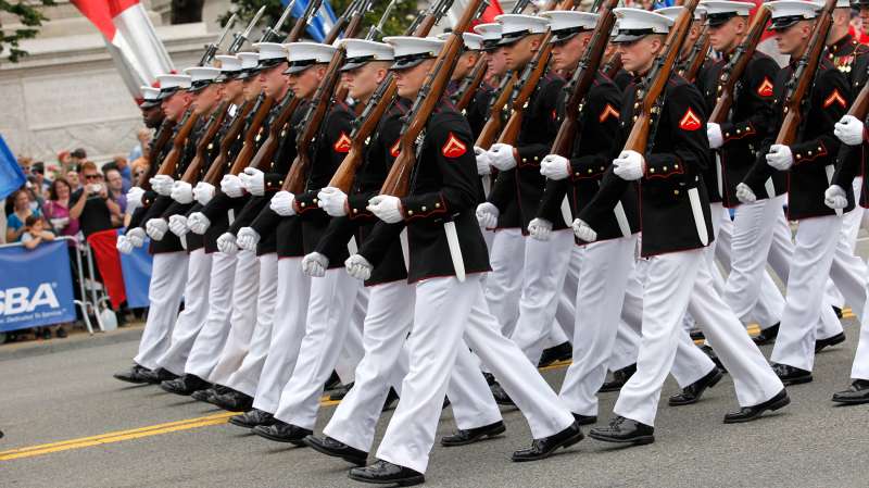 U.S. Marines march during the National Memorial Day Parade on Constitution Avenue in Washington, May 27, 2013.
