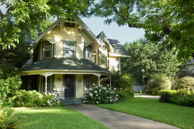 yellow victorian style house