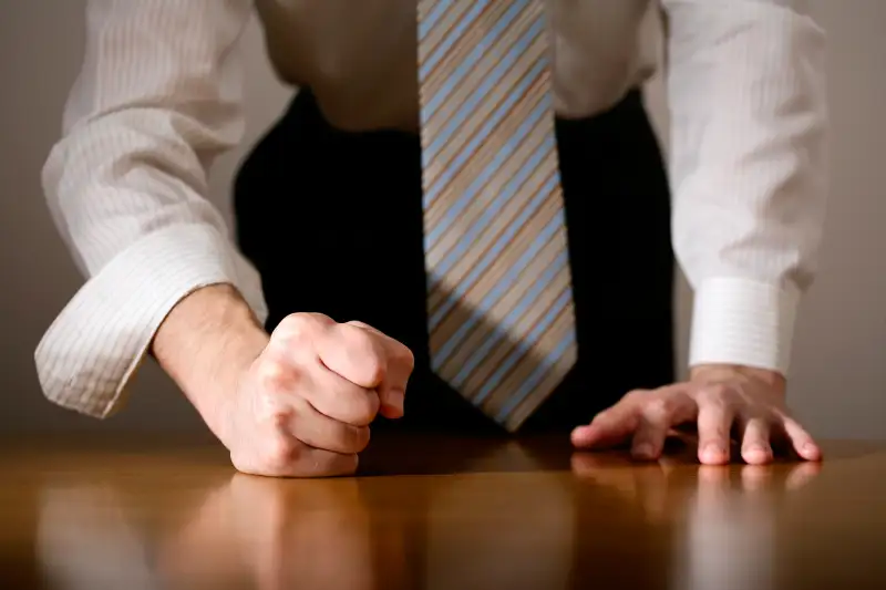 fist on desk
