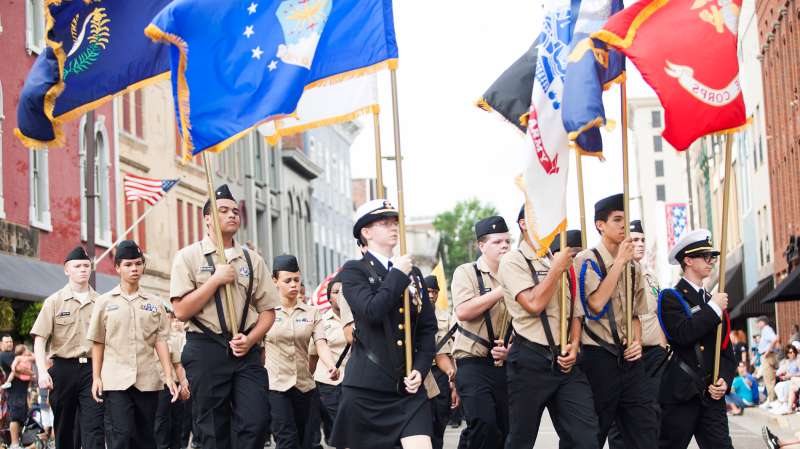 The Paducah Tilghman High School Navy ROTC leads the Labor Day parade on Monday, Sept. 1, 2014 during the Labor Day parade in downtown Paducah, Kentucky.