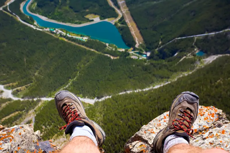 standing on edge of cliff