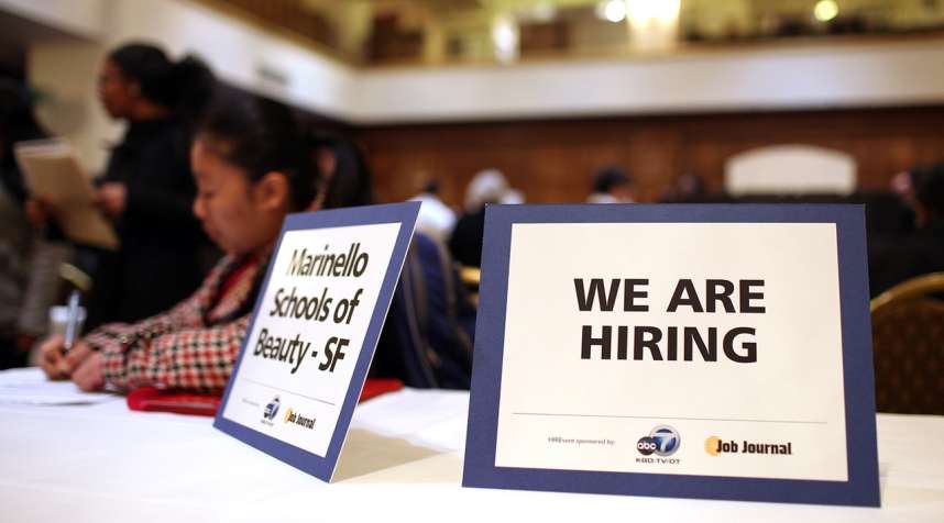 SAN FRANCISCO, CA - MARCH 27:  A  we are hiring  sign is displayed on a table during the San Francisco Hirevent job fair at the Hotel Whitcomb on March 27, 2012 in San Francisco, California. As the national unemployment rate stands at 8.3 percent, job seekers turned out to meet with recruiters at the San Francisco Hirevent job fair where hundreds of jobs were available.  (Photo by Justin Sullivan/Getty Images)