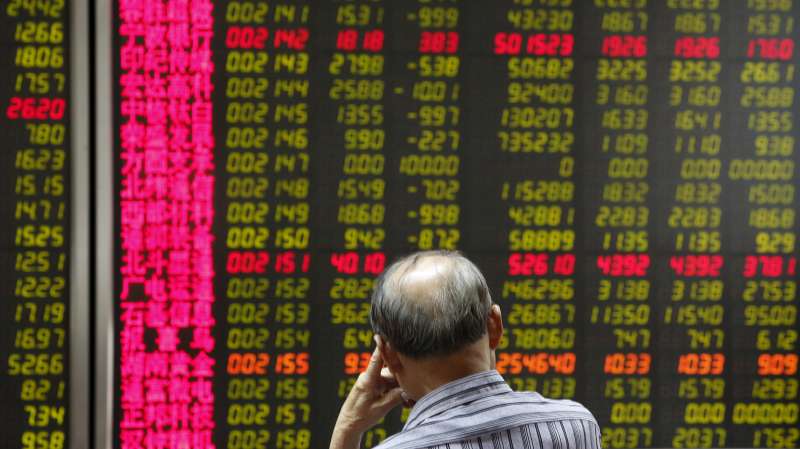 Stock prices at a brokerage office in Beijing, China, July 6, 2015
