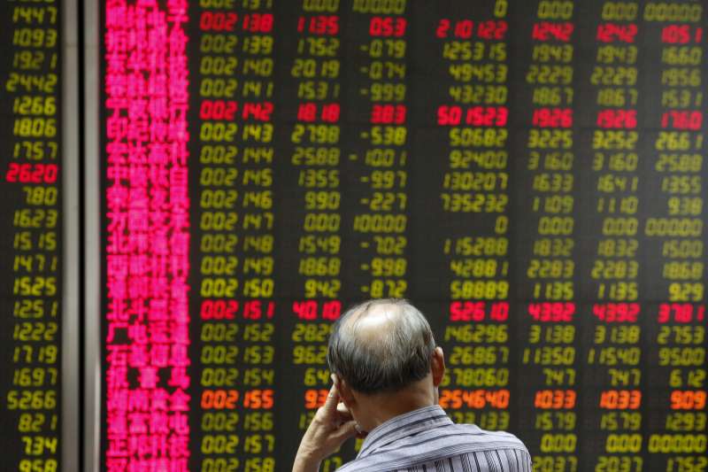 Stock prices at a brokerage office in Beijing, China, July 6, 2015