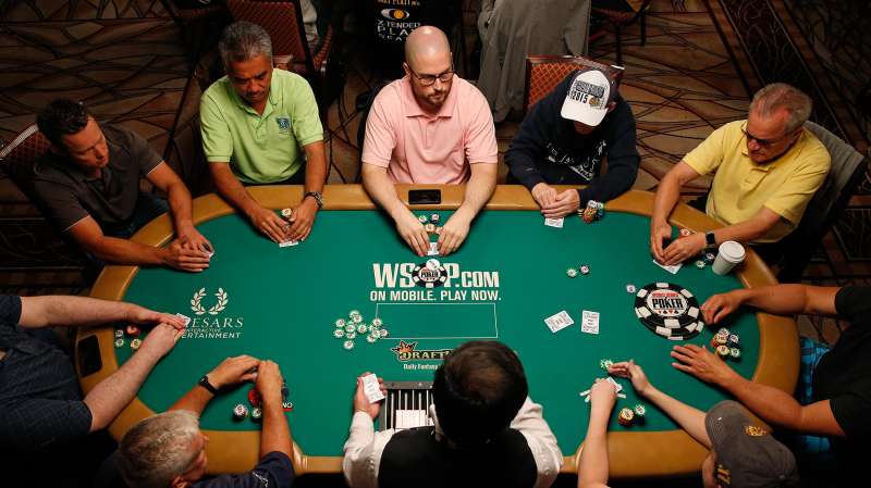 Players compete during the main event at the World Series of Poker Wednesday, July 8, 2015, in Las Vegas.
