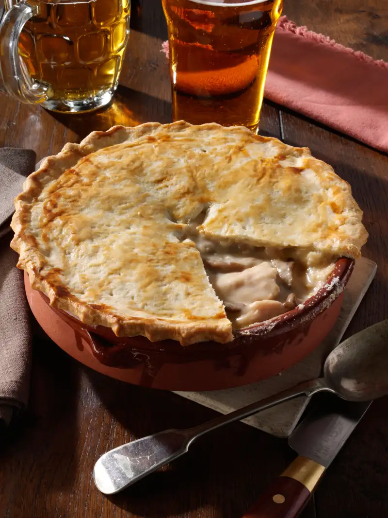 Pie with pint glasses of beer