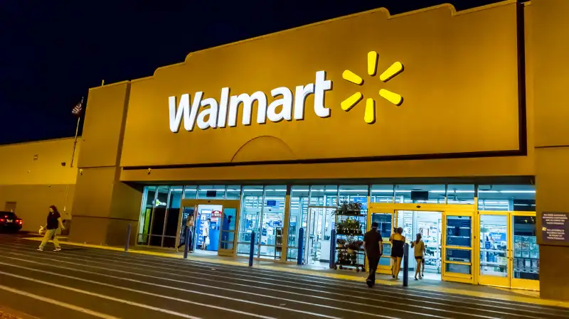 Exterior of Walmart store at night