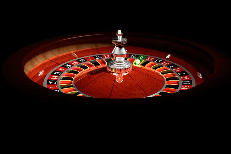 Roulette Wheel with ball on  0