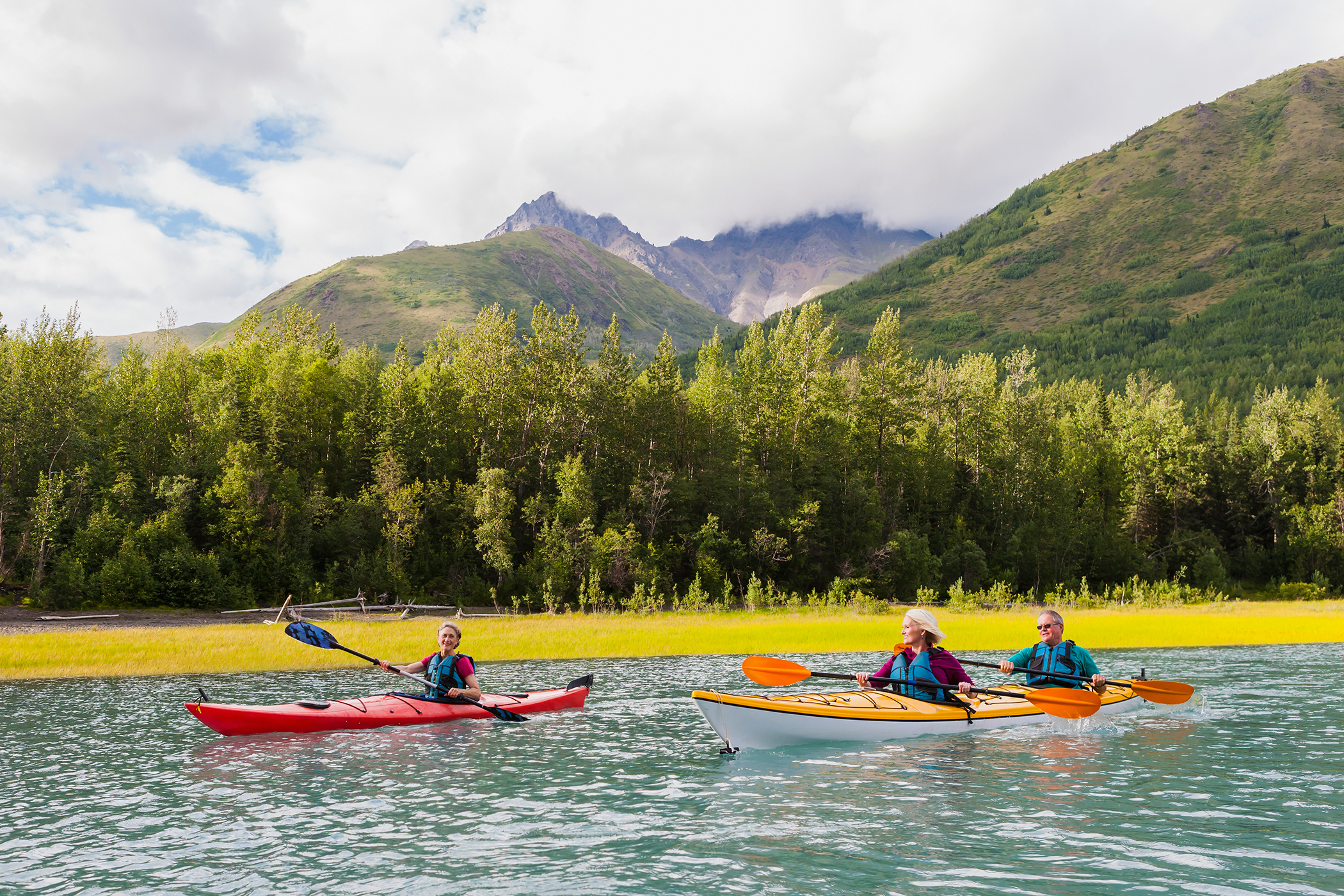 Recreational kayak touring in Eklutna Lake, Chugach State Park, Alaska
