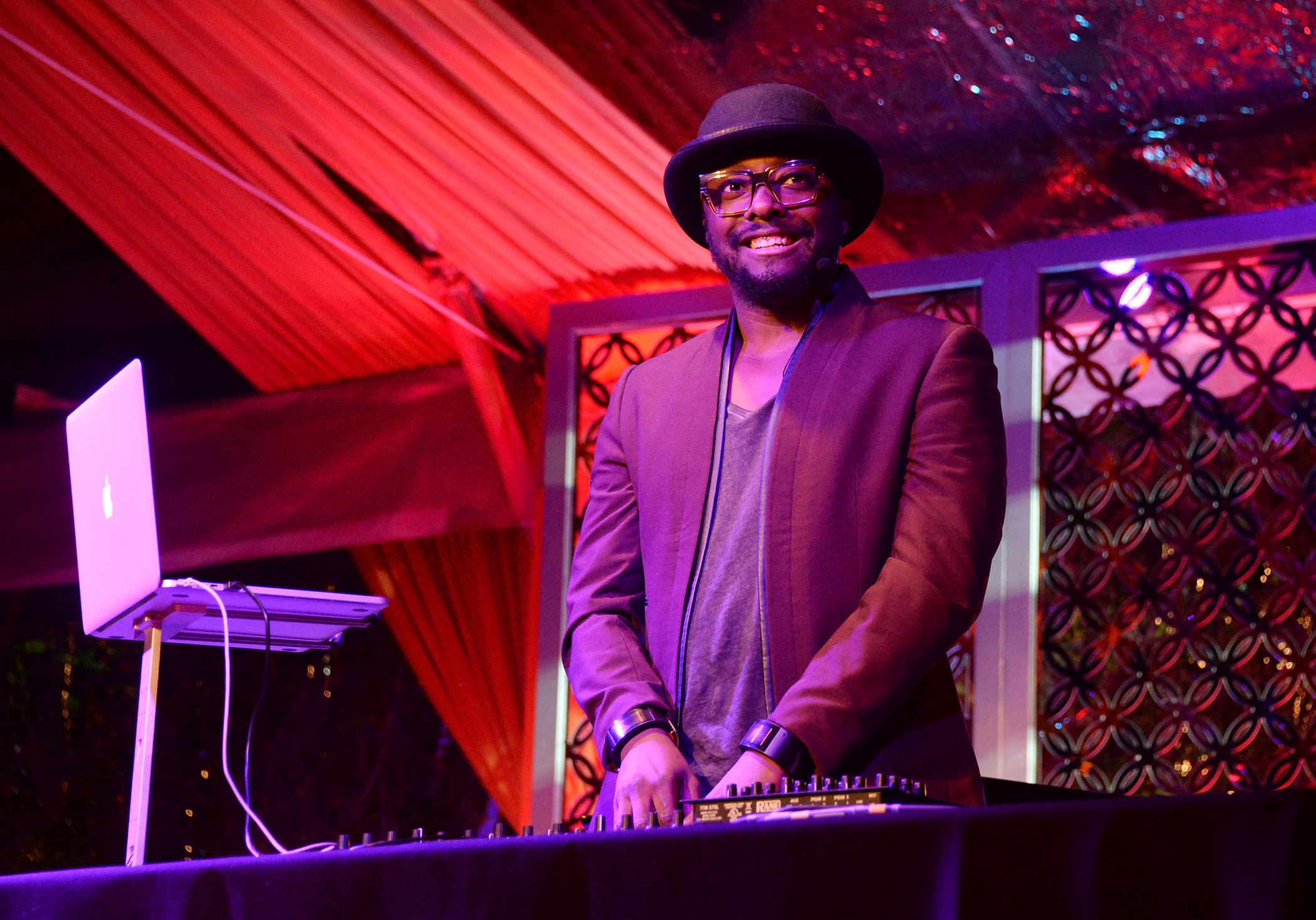 Musician will.i.am performs at Goldie Hawn's inaugural  Love In For Kids  benefiting the Hawn Foundation's MindUp program transforming children's lives for greater success at Ron Burkles Green Acres Estate on November 21, 2014 in Beverly Hills, California.