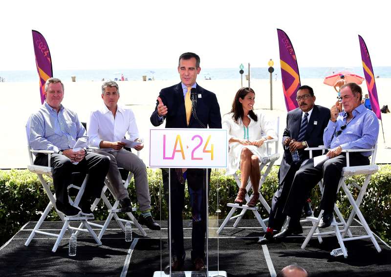 Los Angeles Mayor Eric Garcetti speaks at a press conference as he is joined by (L-R) USOC CEO Scott Blackmun, LA 2024 Chairman Casey Wasserman, Olympian Janet Evens, LA City Cuncil President Herb Wesson and announcer AL Michaels to officially launch a Los Angeles 2024 Olympic and Paralympic games bid at Annenberg Beach House on September 1, 2015 in Santa Monica, California.