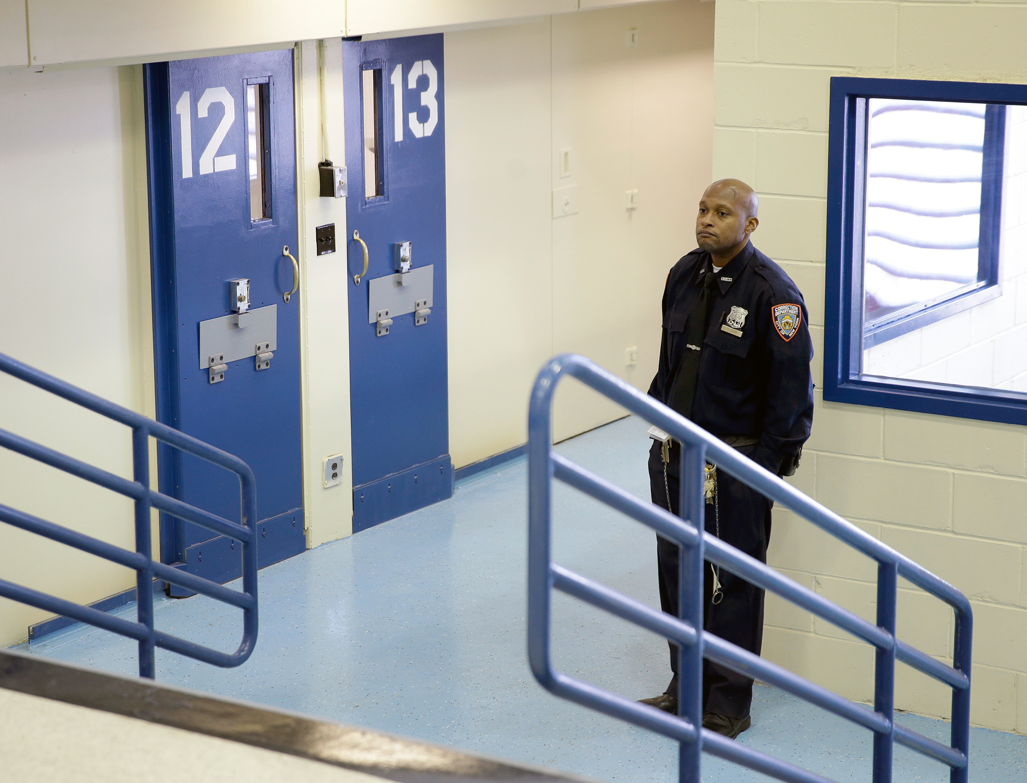 A corrections officers in an enhanced supervision housing unit on Rikers Island in New York, Thursday, March 12, 2015.