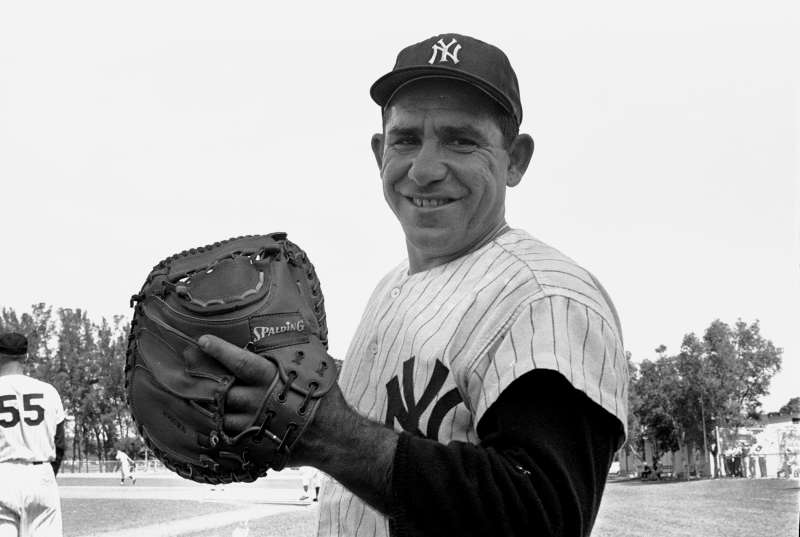 New York Yankees catcher, Yogi Berra with his finger out of the glove during spring training in Tampa, March 1961.