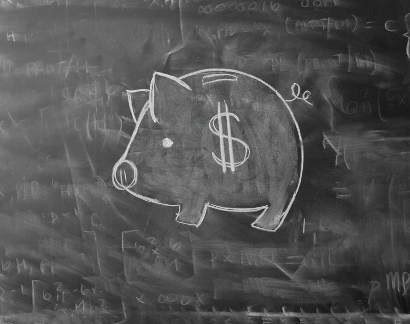 Piggy Bank Drawn on Blackboard