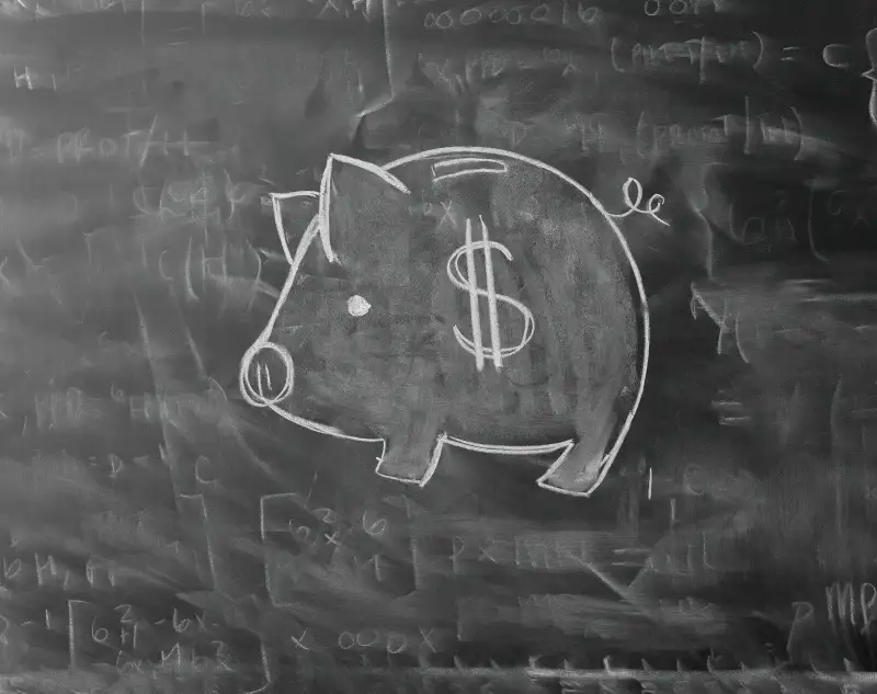 Piggy Bank Drawn on Blackboard