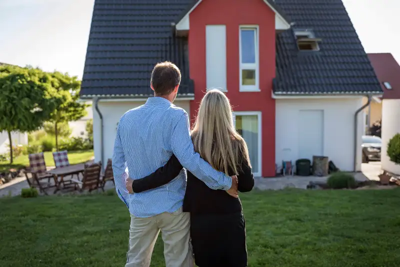 couple looking at house