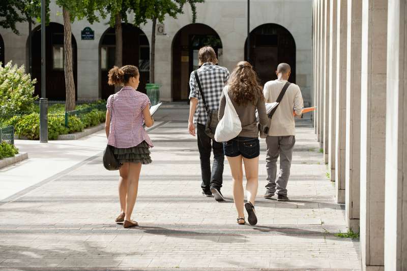 college students walking on campus