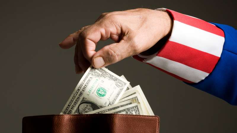 uncle sam taking money out of wallet
