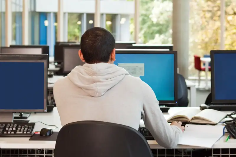 student working at computer