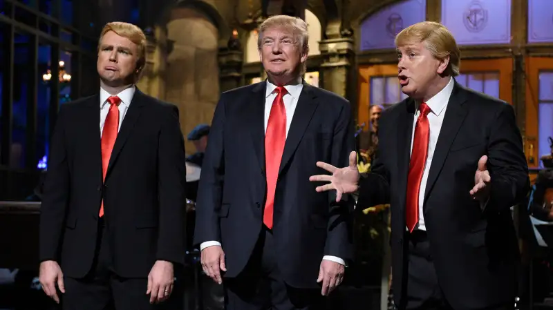 Saturday Night Live Donald Trump Episode with (l-r) Taran Killam, Donald Trump, and Darrell Hammond during the monologue on November 7, 2015.