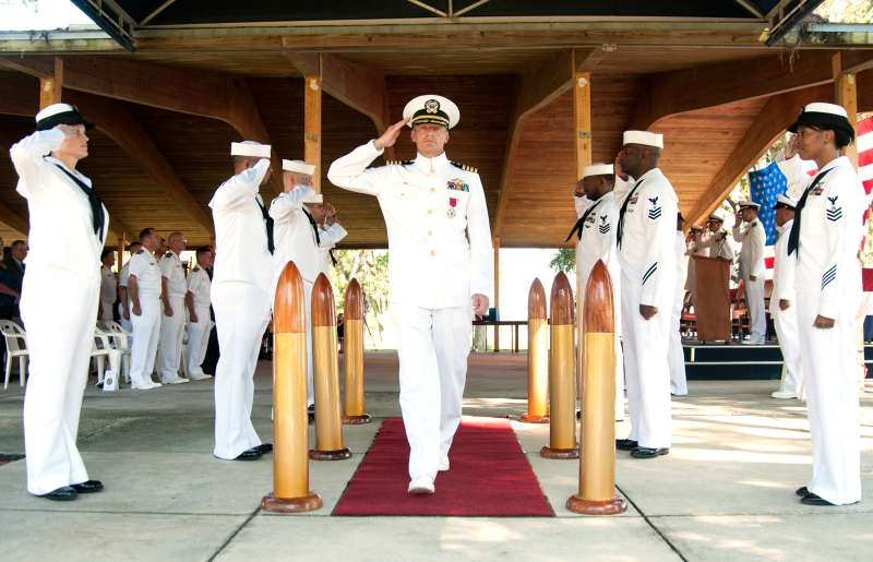 Captain Gregory Smith is piped ashore during his retirement ceremony aboard Naval Air Station Jacksonville. Smith retired after 28 years of honorable military service after being relieved of command of Navy Region Southeast Reserve Component Command.