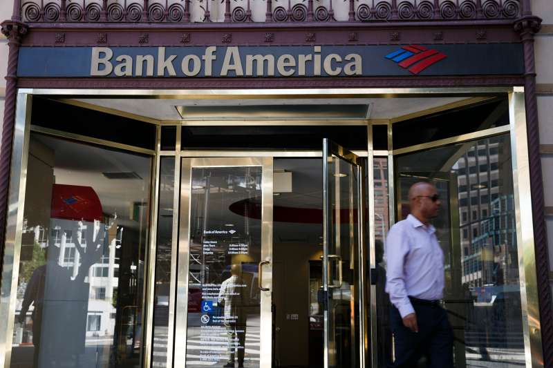 A man exits a Bank of America branch in Los Angeles, California, on July 13, 2015.