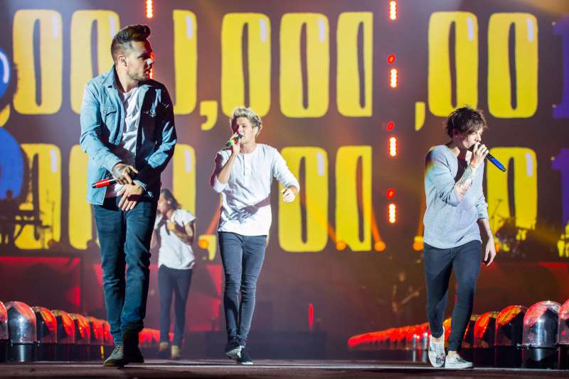 Liam Payne, Harry Styles, Niall Horan and Louis Tomlinson of One Direction perform in support of the On The Road Again Tour at Ford Field on August 29, 2015 in Detroit, Michigan.