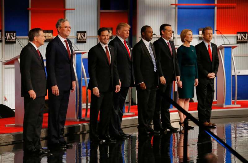 Republican U.S. presidential candidates (L-R) Governor John Kasich, former Governor Jeb Bush, U.S. Senator Marco Rubio, businessman Donald Trump, Dr. Ben Carson, U.S. Senator Ted Cruz, former HP CEO Carly Fiorina and U.S. Rep. Rand Paul pose during a photo opportunity before the debate held by Fox Business Network for the top 2016 U.S. Republican presidential candidates in Milwaukee, Wisconsin, November 10, 2015.