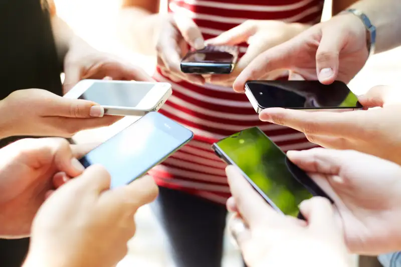 people holding phones