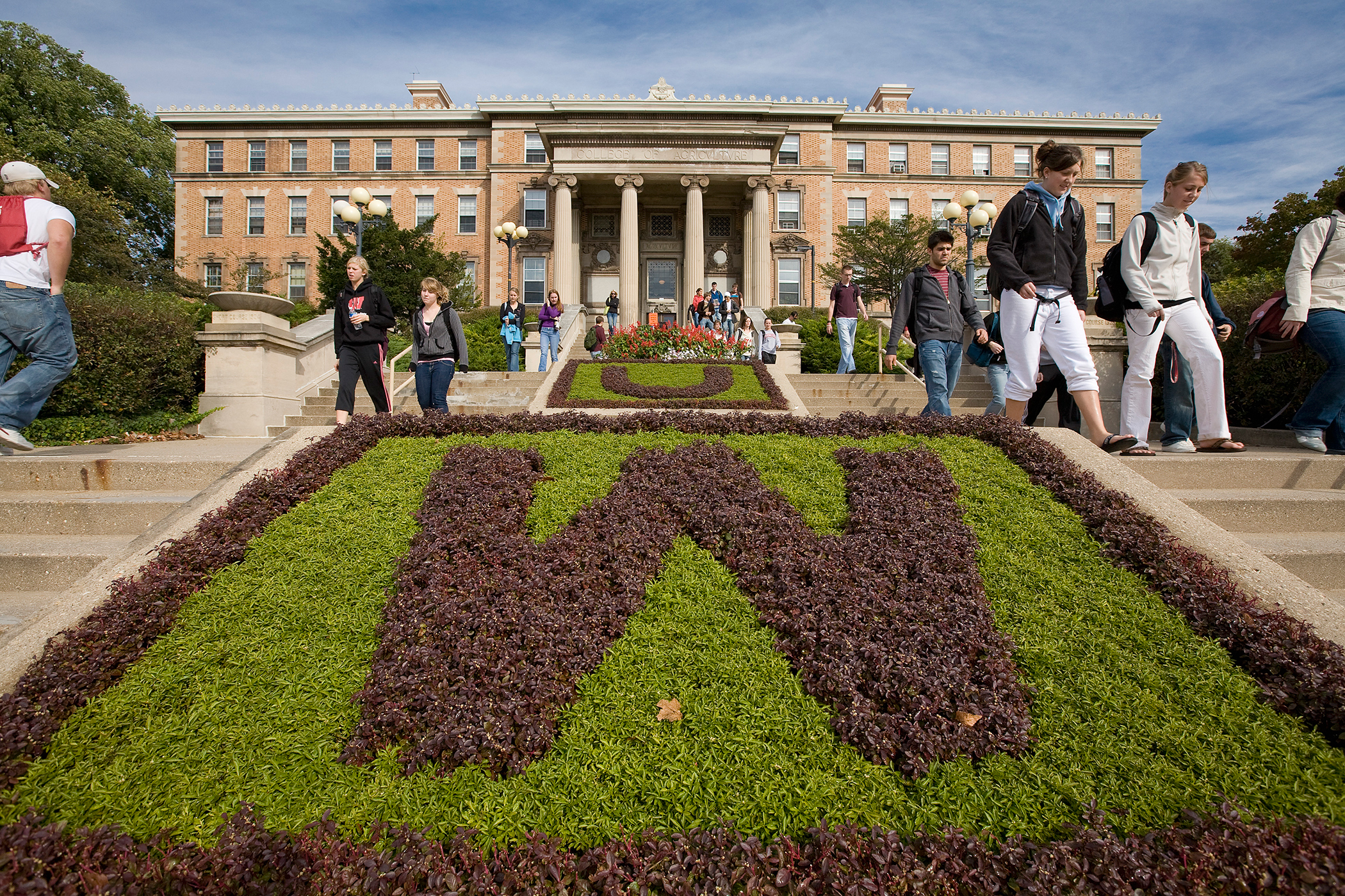Students make their way between classes on the steps of Agricultural Hall at the University of Wisconsin-Madsion on October 17, 2007.