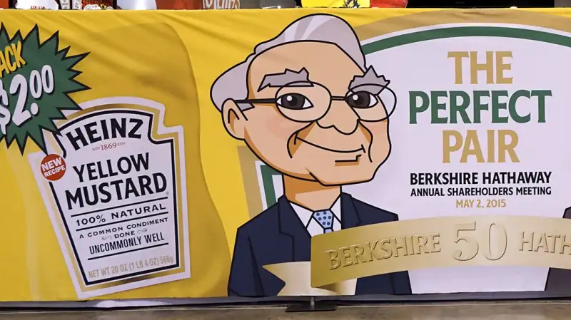 A Berkshire Hathaway shareholder walks by a Heinz company display at the shareholder's shopping day in Omaha, Nebraska May 1, 2015. Berkshire-owned Heinz was selling ketchup and mustard special editon bottles featuring images of Berkshire CEO Warren Buffett and Berkshire vice-chairman Charlie Munger.