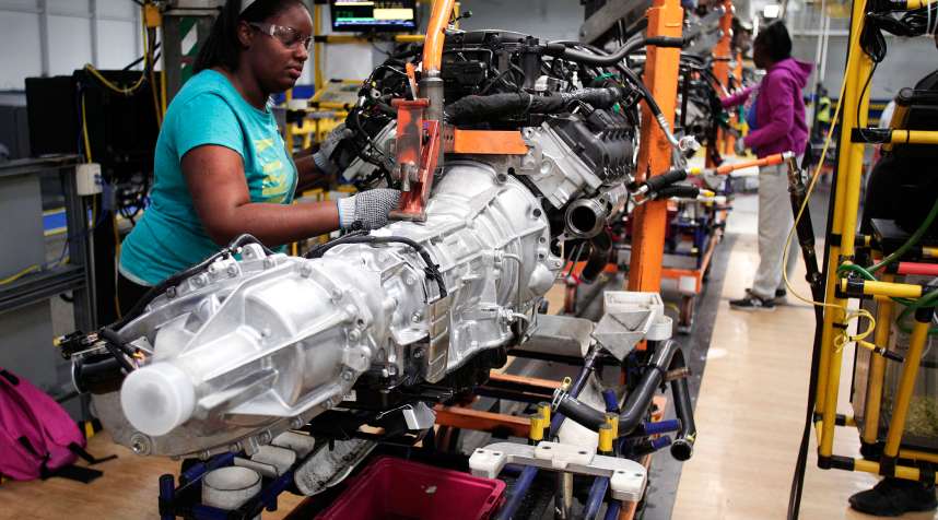 A transmission for a Chrysler Ram 1500 truck goes through the assembly line at the Warren Truck Assembly Plant in Warren, Mich., in Sept. 2014.