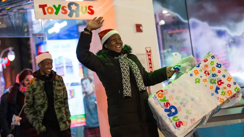 People enter the Toys R Us in Times Square at 5PM to begin shopping on November 27, 2014 in New York, United States.