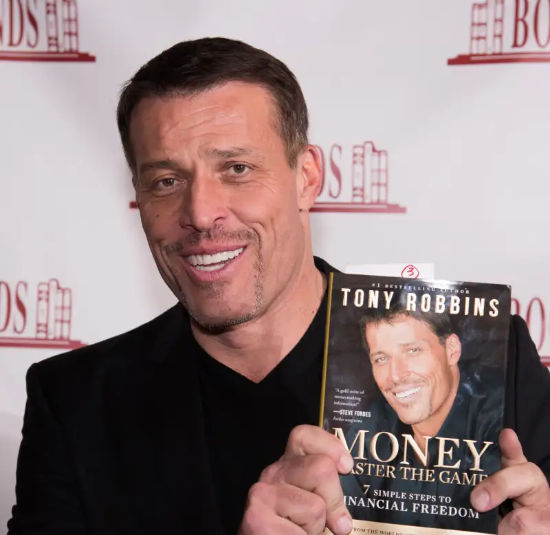 Tony Robbins Signs Copies Of His Book  Money: Master Of The Game