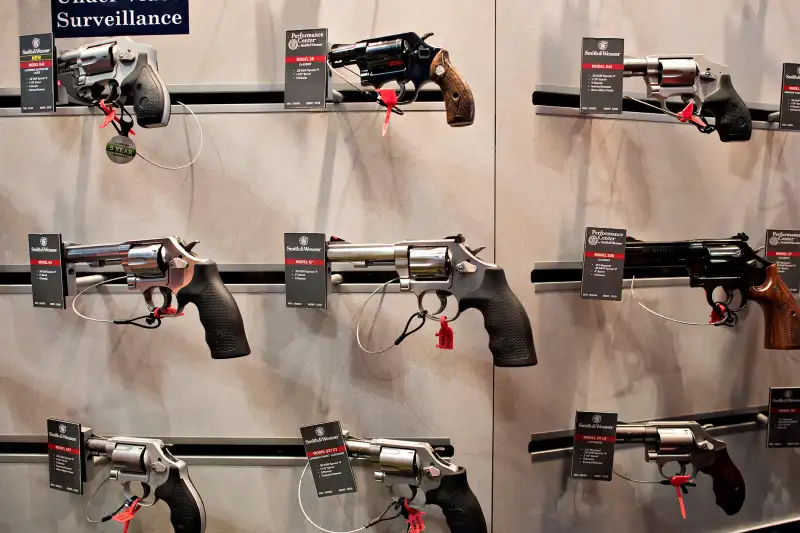 Revolvers sit on display in the Smith & Wesson booth on the exhibition floor of the 144th National Rifle Association (NRA) Annual Meetings and Exhibits at the Music City Center in Nashville, Tennessee, on April 11, 2015.