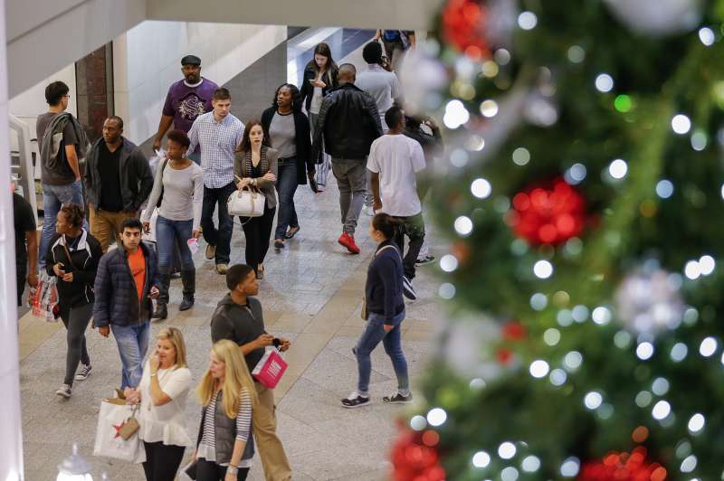 Early 'Black Friday' shoppers crowd the Lenox Square Mall in Atlanta, November 26, 2015. The mall opened early for people wanting to get some holiday shopping sale deals.