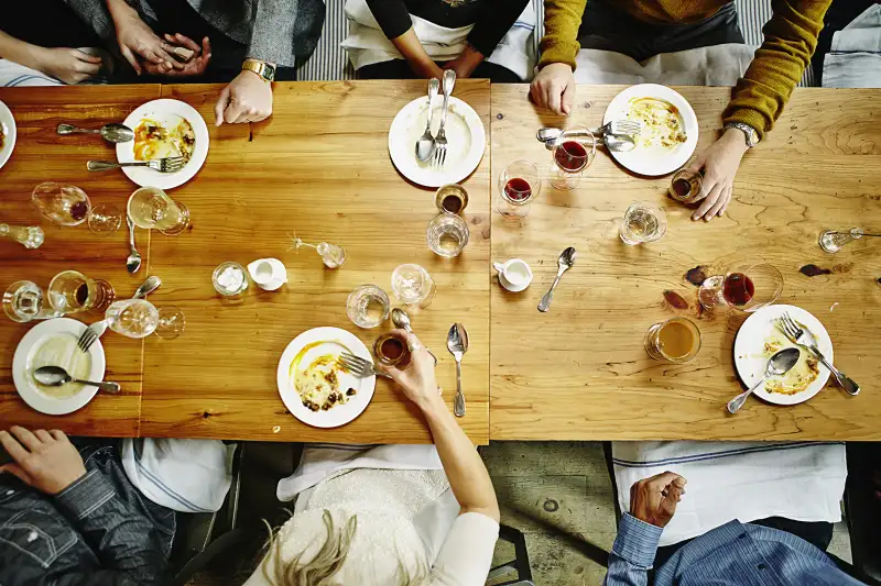 Several people at a restaurant table